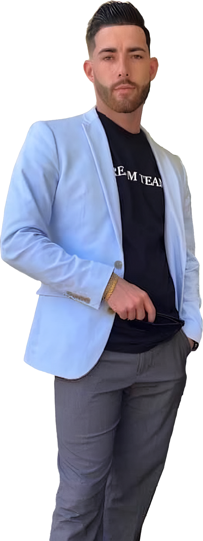 The founder of Kingdom Portfolios in a light-blue blazer and Dream Team shirt